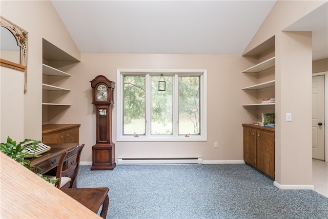 office space featuring baseboard heating, lofted ceiling, and carpet floors