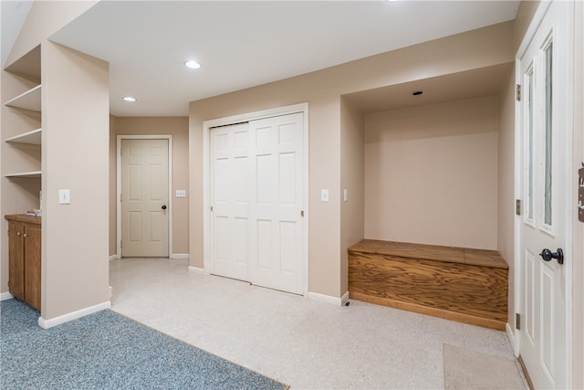 unfurnished bedroom with light carpet