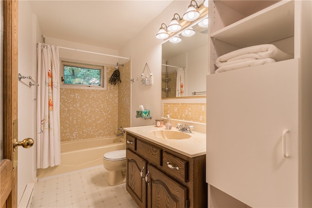 full bathroom featuring toilet, vanity, and shower / bath combo with shower curtain