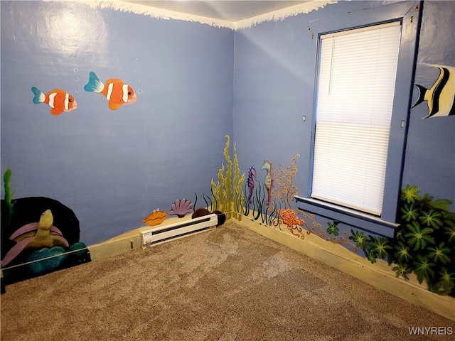 playroom with baseboard heating and carpet flooring