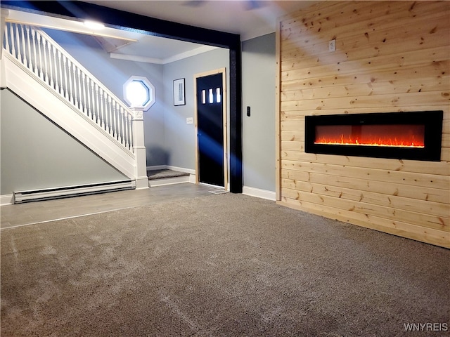 carpeted entrance foyer featuring beam ceiling, a baseboard radiator, and wood walls