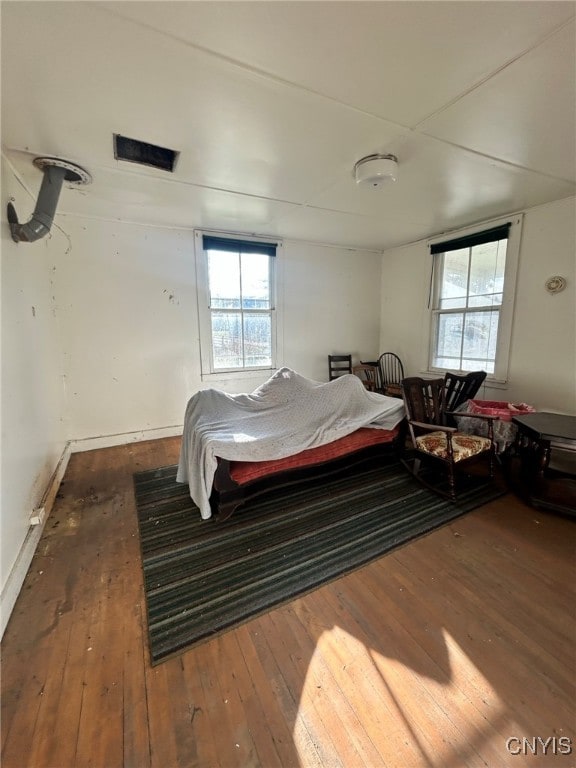 bedroom featuring dark wood-type flooring