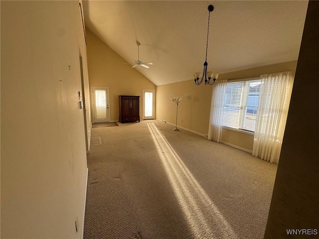 unfurnished room featuring a chandelier, light carpet, high vaulted ceiling, and baseboards