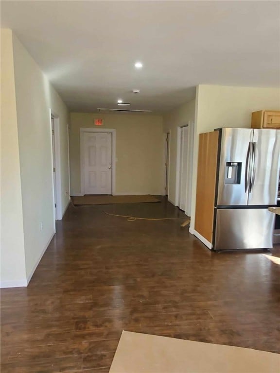 corridor featuring dark wood-type flooring