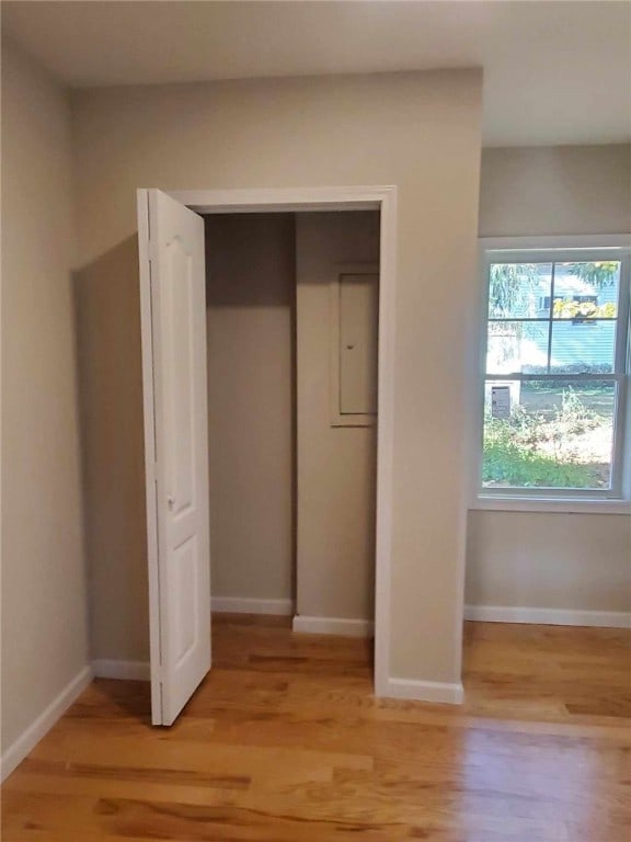 unfurnished bedroom featuring light wood-type flooring