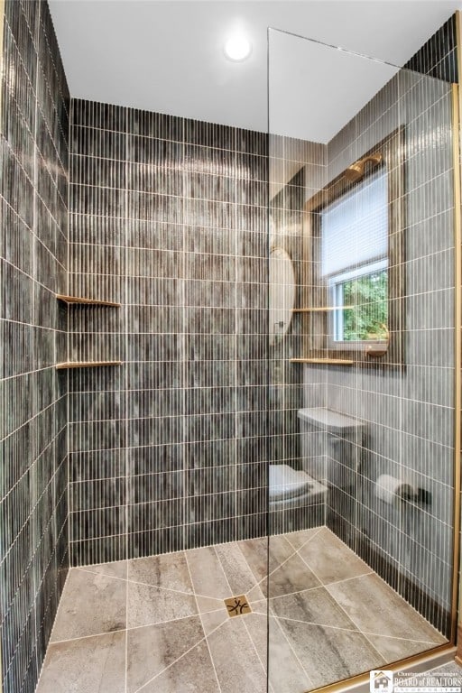 bathroom with tile walls