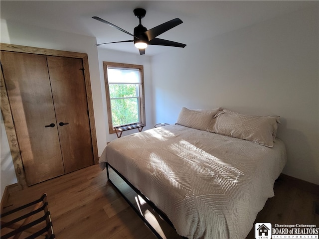 bedroom featuring ceiling fan and hardwood / wood-style floors