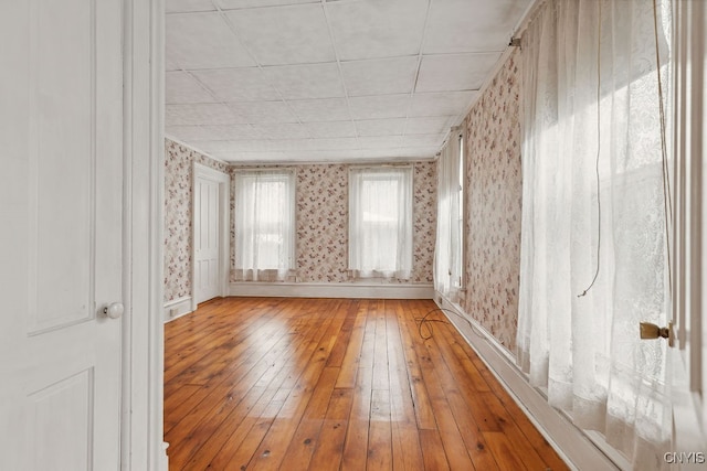 unfurnished room with light wood-type flooring