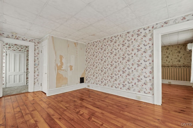 unfurnished room featuring wood-type flooring