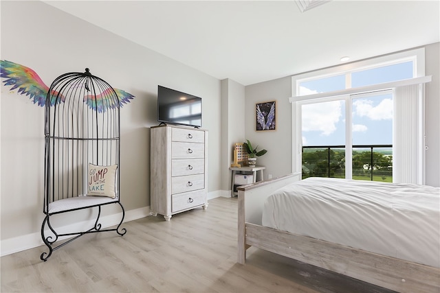 bedroom with light hardwood / wood-style floors