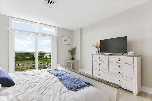 bedroom featuring light hardwood / wood-style flooring