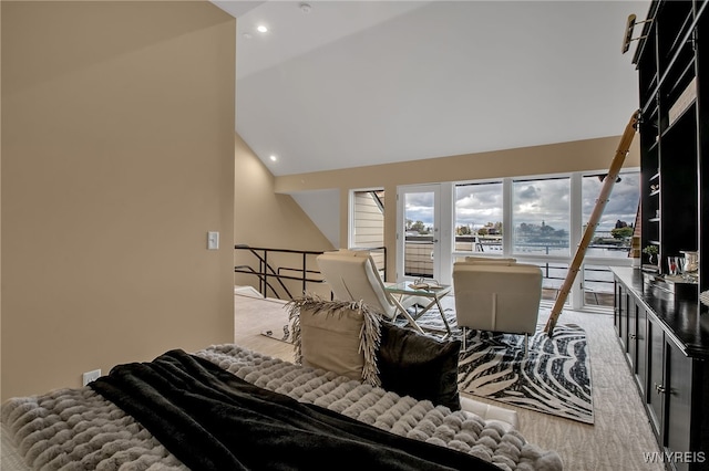 bedroom featuring high vaulted ceiling