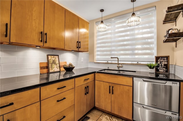 kitchen with decorative backsplash, sink, light tile patterned flooring, a notable chandelier, and stainless steel dishwasher