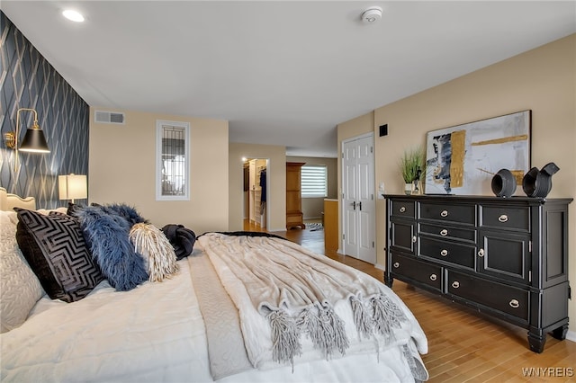 bedroom featuring light hardwood / wood-style flooring