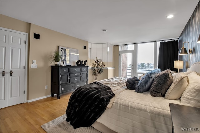 bedroom featuring light hardwood / wood-style floors