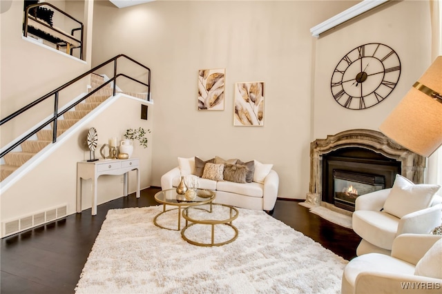 living room featuring dark hardwood / wood-style floors