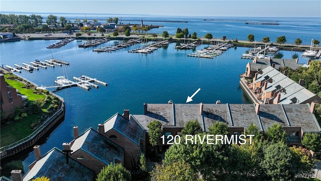 birds eye view of property featuring a water view