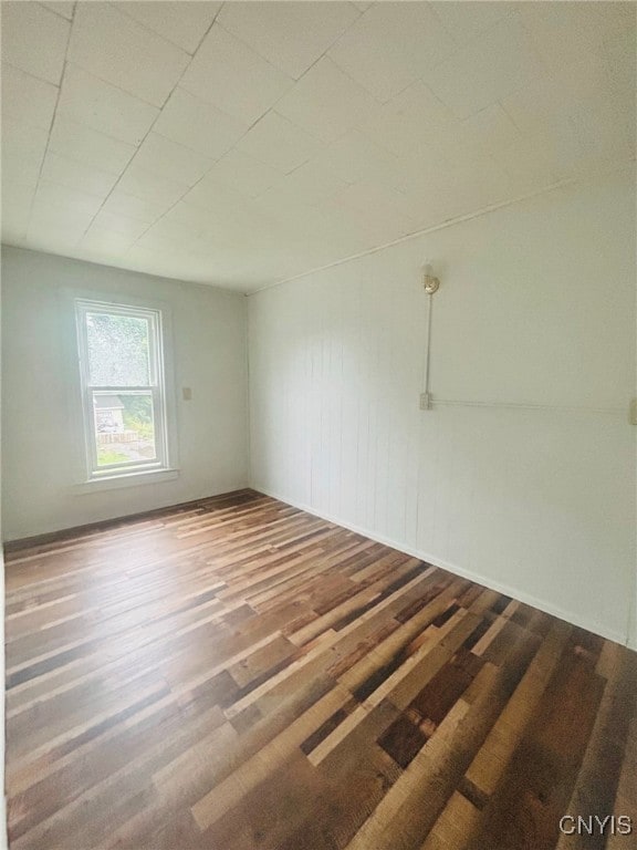 empty room featuring hardwood / wood-style floors