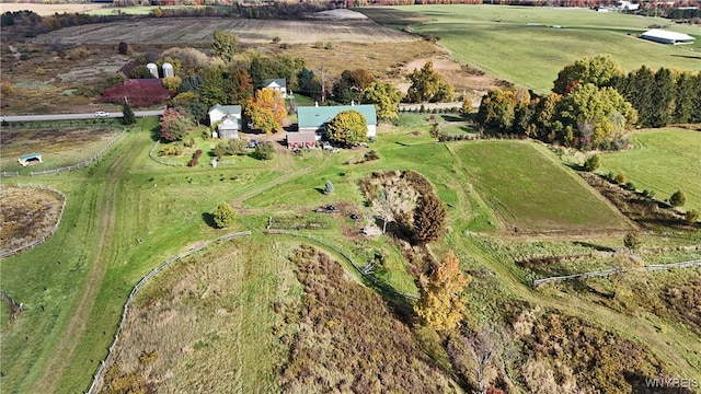 birds eye view of property featuring a rural view