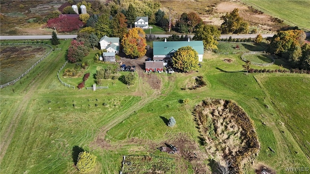 birds eye view of property with a rural view