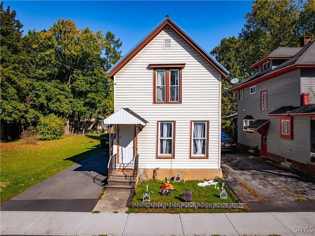 42 3rd St, German Flatts, NY 13357 - view of front of house with entry steps, a front yard, and asphalt driveway