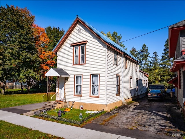 view of front of house with a front yard