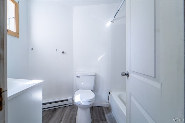 full bathroom with wood-type flooring, a baseboard heating unit, toilet, vanity, and shower / bathtub combination