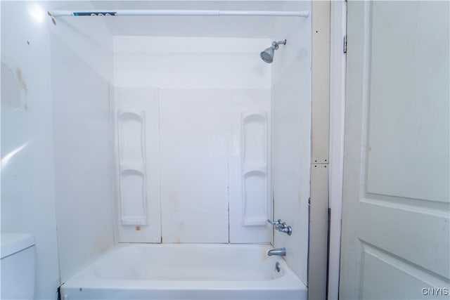 bathroom with toilet and shower / bathtub combination