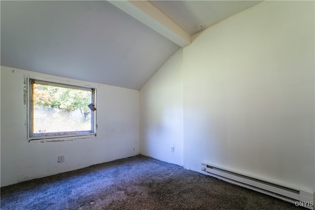 empty room featuring carpet flooring, vaulted ceiling, and baseboard heating