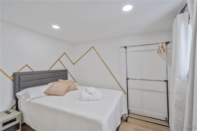 bedroom featuring light wood-type flooring