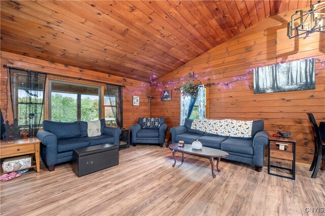 living room featuring wood walls, hardwood / wood-style floors, lofted ceiling, and wood ceiling