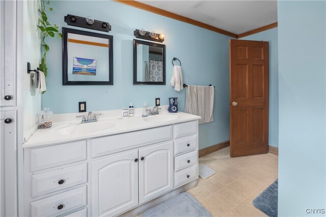 bathroom featuring vanity and ornamental molding