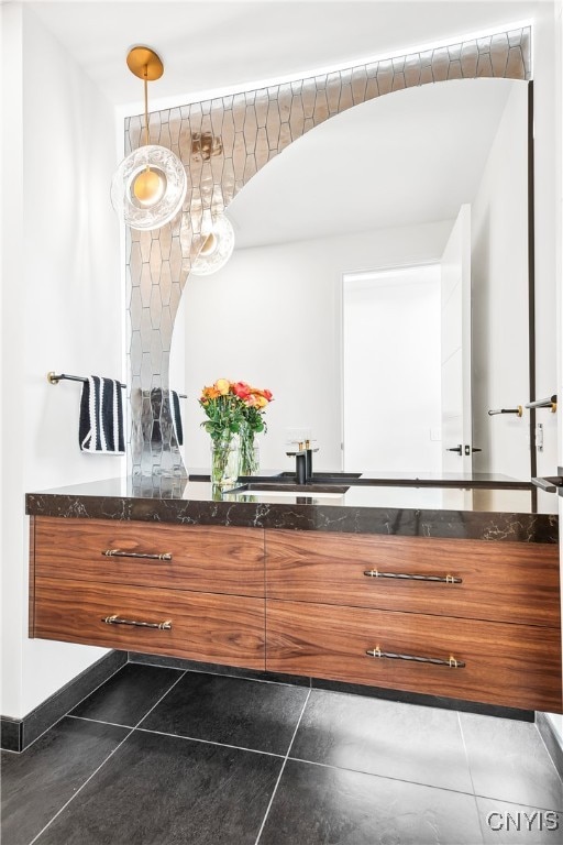 bathroom with vanity and tile patterned floors