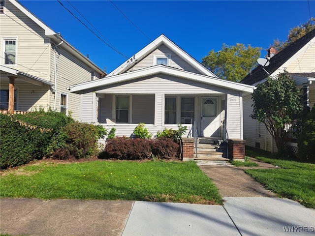 view of front of property with a front lawn