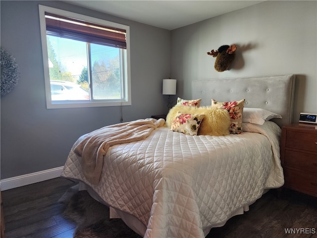 bedroom featuring dark hardwood / wood-style floors