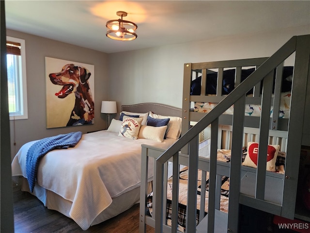 bedroom featuring dark wood-type flooring