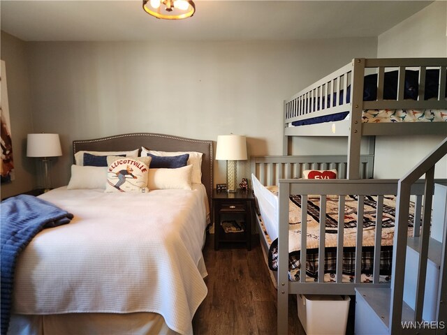 bedroom featuring dark hardwood / wood-style flooring