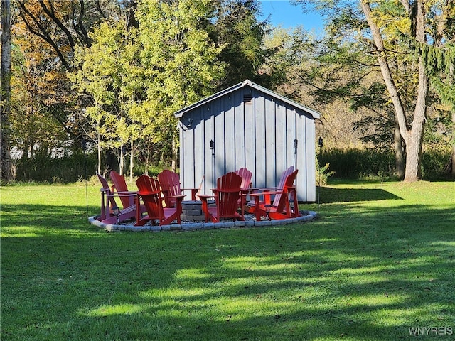 view of outbuilding with a yard