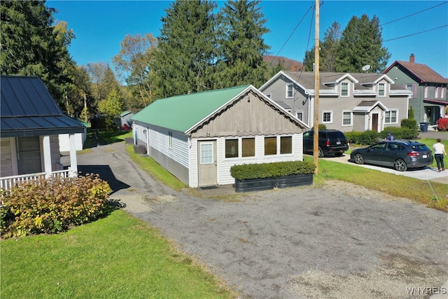 view of home's exterior with a yard