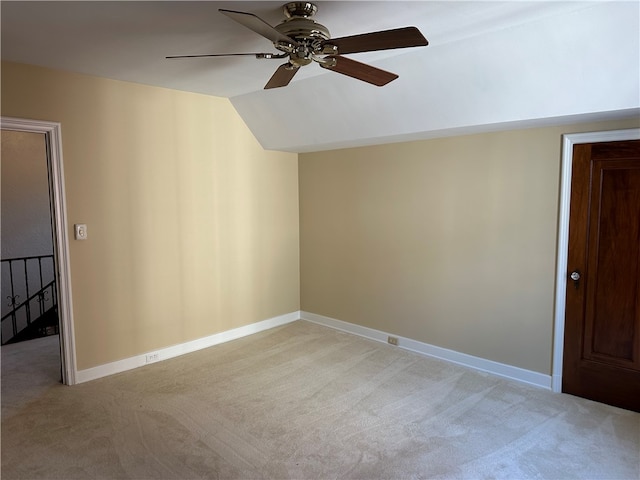 bonus room featuring lofted ceiling, light carpet, and ceiling fan