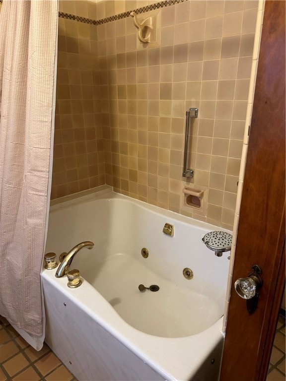 bathroom featuring tile patterned floors and shower / tub combo with curtain