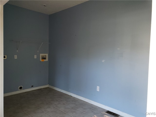 clothes washing area featuring electric dryer hookup, washer hookup, and tile patterned floors