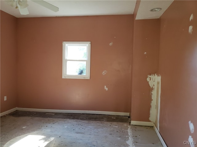 spare room with ceiling fan