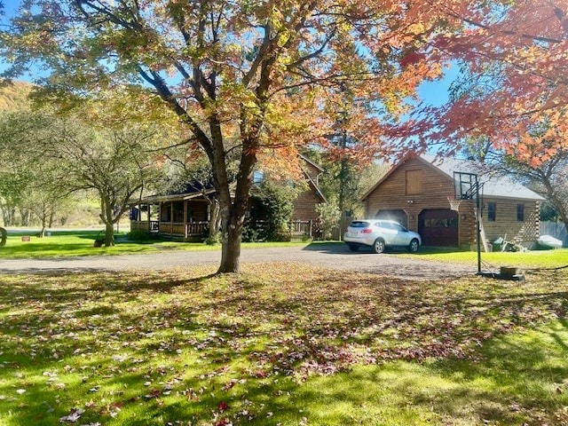 view of yard featuring a garage