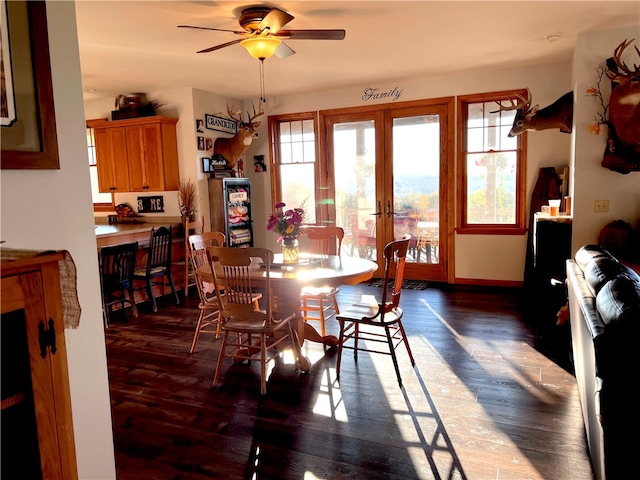 dining area with french doors, ceiling fan, and dark hardwood / wood-style flooring