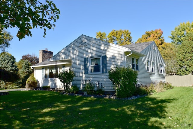 exterior space with a yard