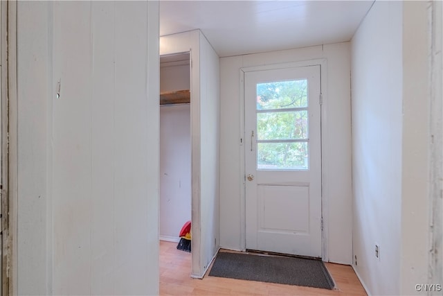 doorway with light hardwood / wood-style flooring