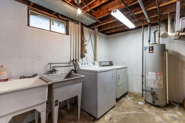 laundry room featuring washer and dryer and gas water heater