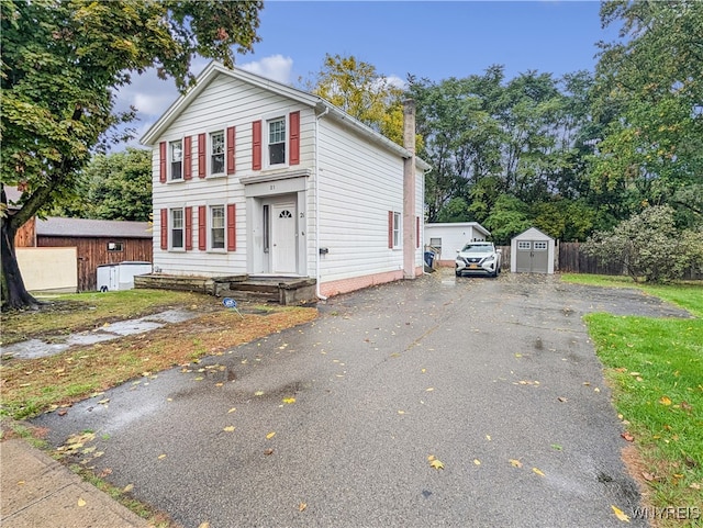 front of property with a shed