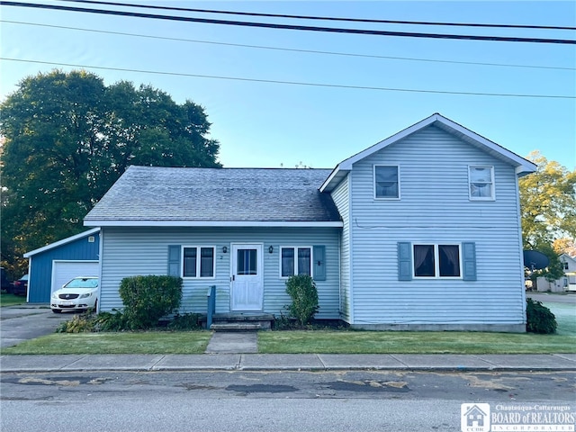 view of property with a front lawn